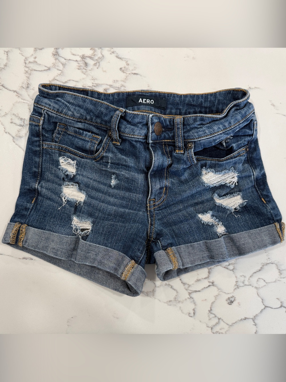 AERO Women's Dark Blue Distressed Rolled Cuff Denim Shorts - Picture 1 of 5